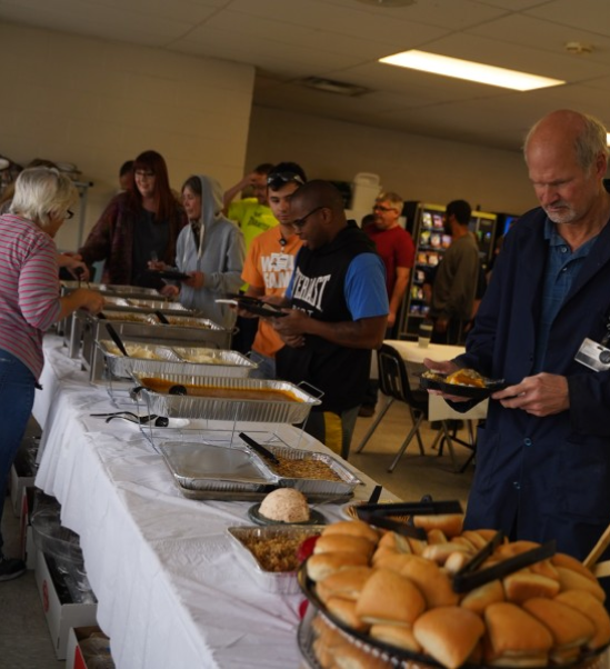 a group of people at a buffet